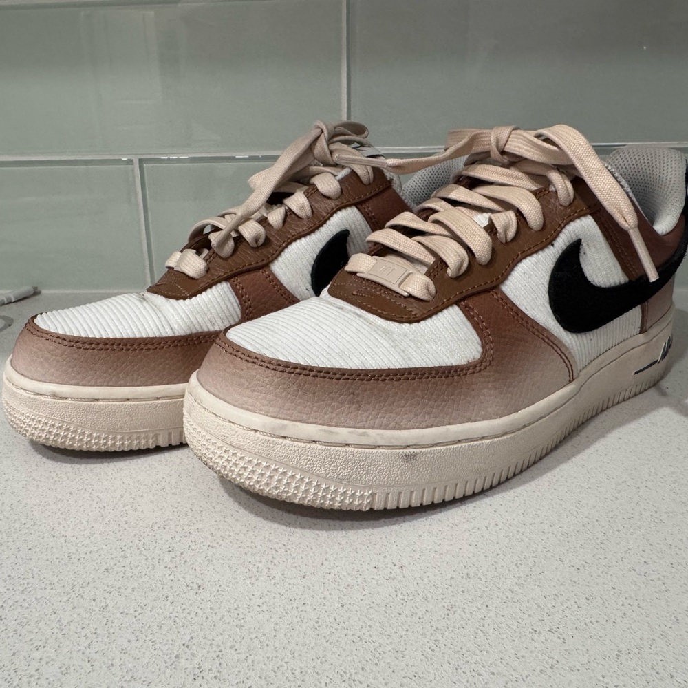 Nike Brown and White Sneakers with Classic Air Force 1 Design
